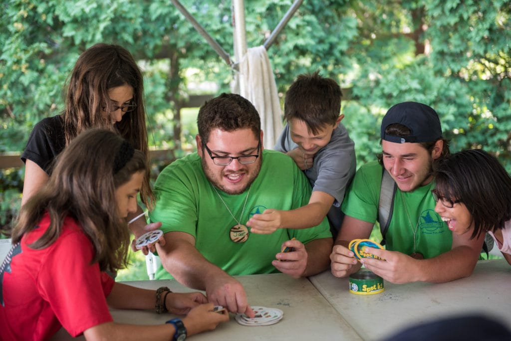 kids hanging out with counselor