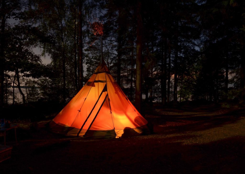 glowing camp at night