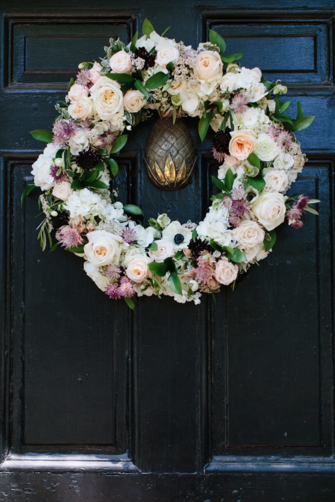 inn door with flower wreath